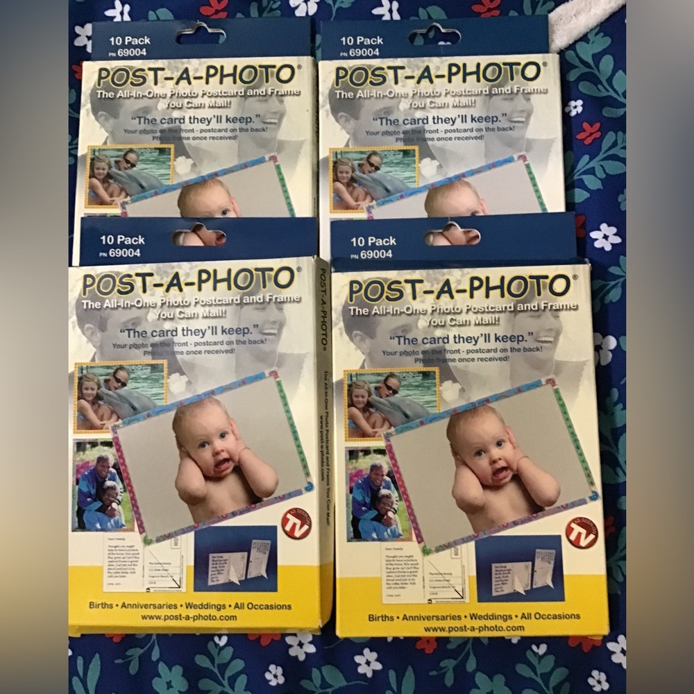 A total of  4 boxes of post a photo, the all in one photo postcard, and frame